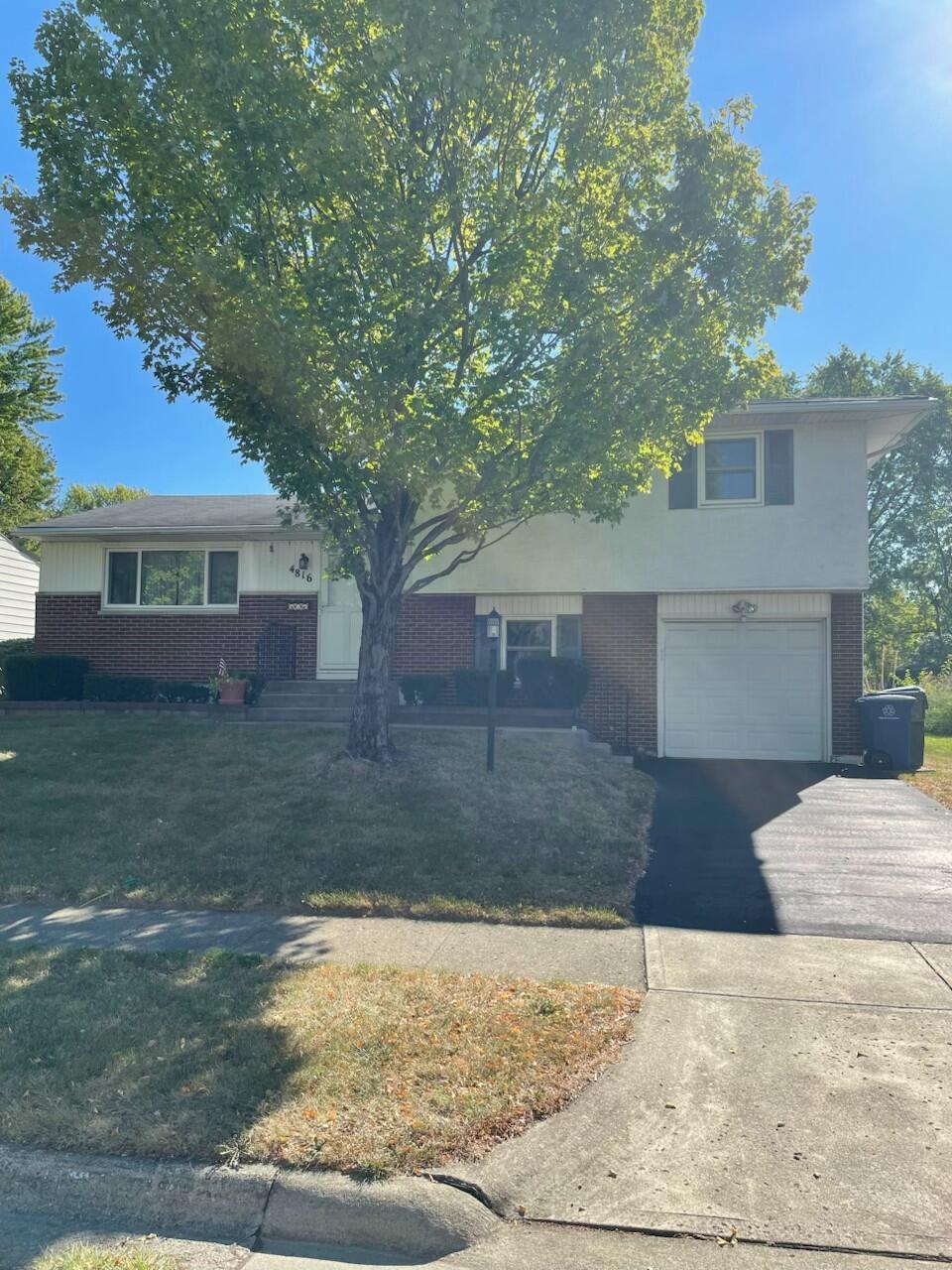 Vintage Brick and Stucco 4 level split level with room to roam.