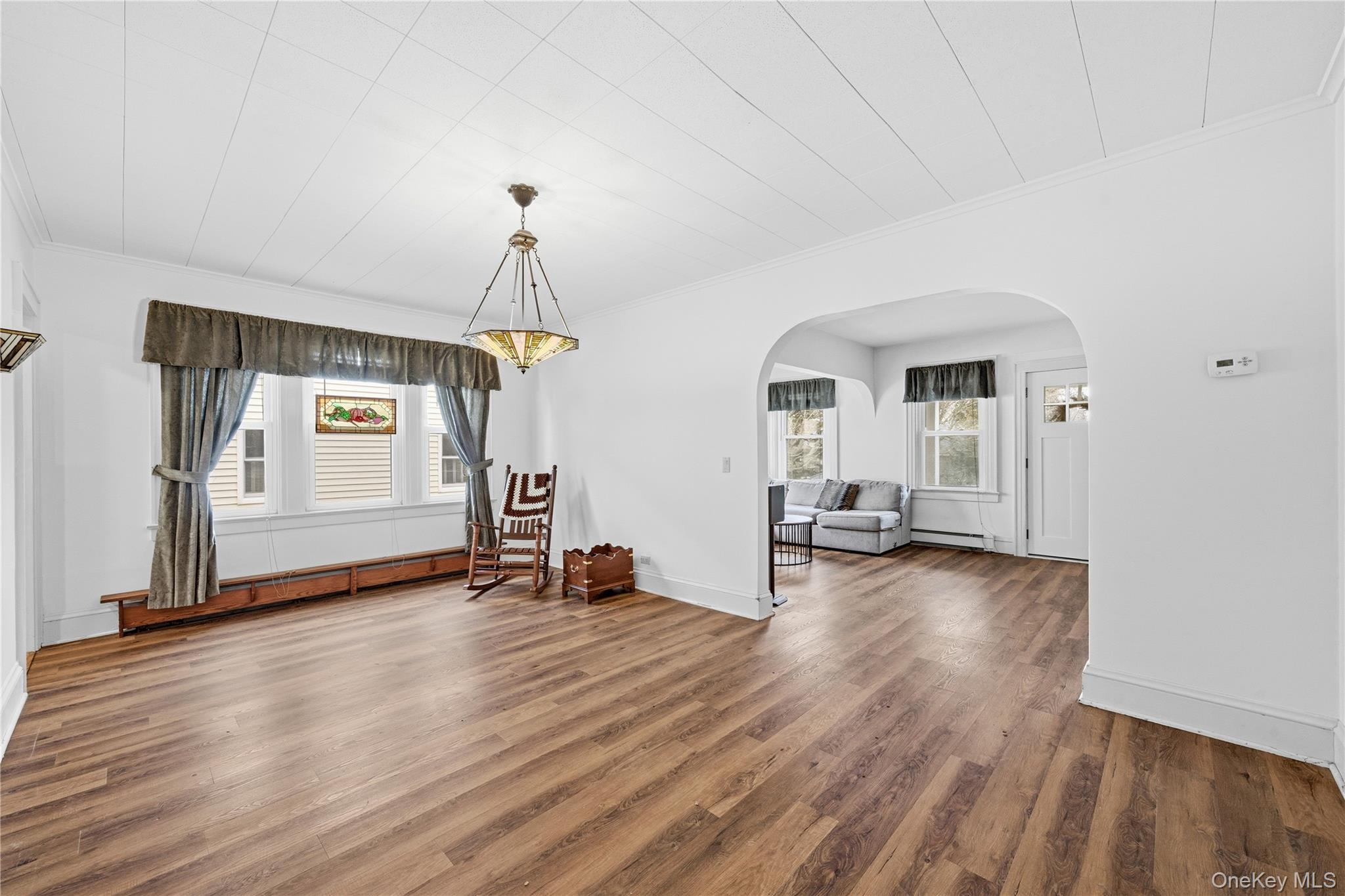 147 Church Avenue Islip, NY 11751 - Photo 12 of 40 a view of empty room with wooden floor
