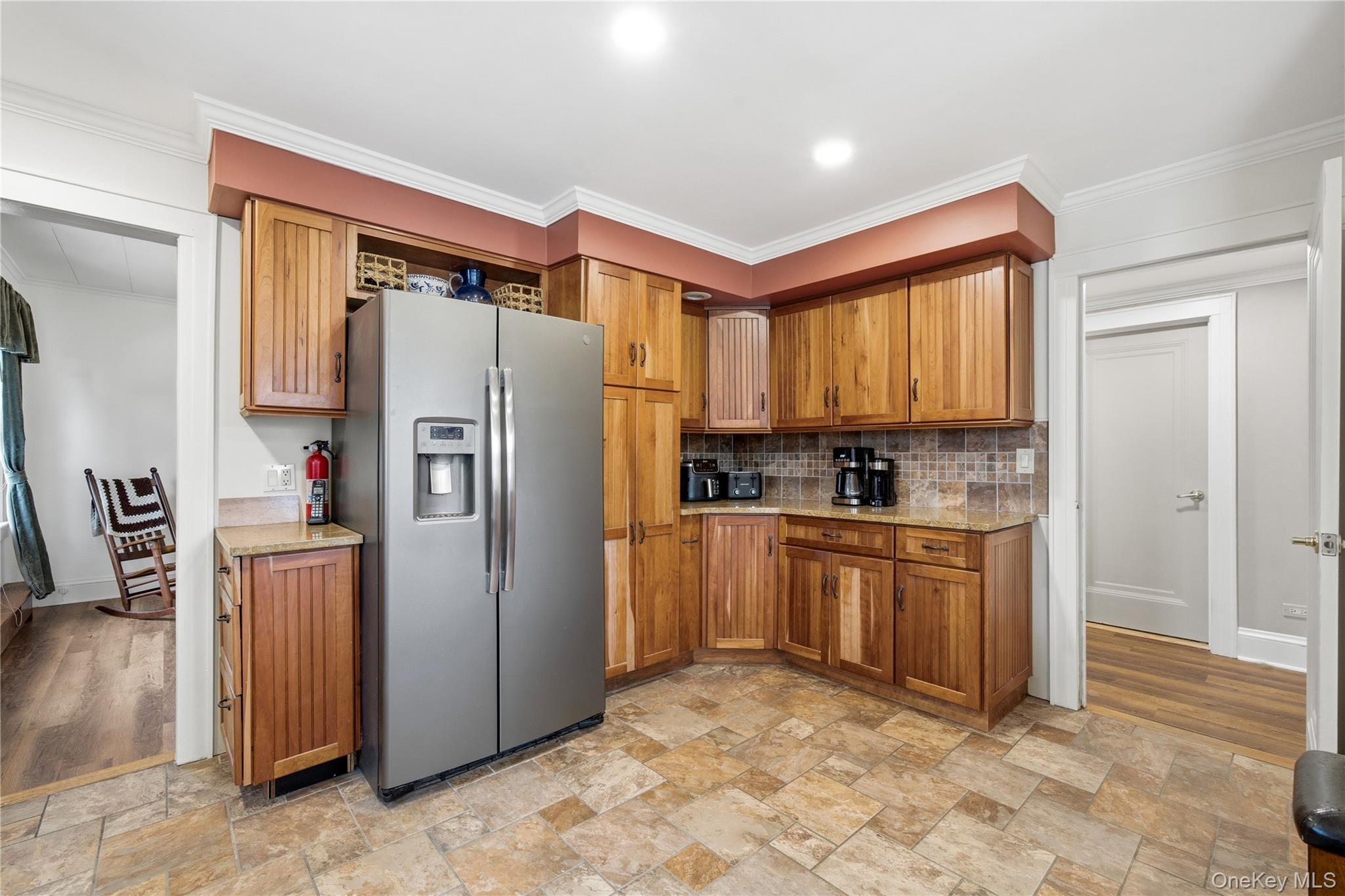147 Church Avenue Islip, NY 11751 - Photo 15 of 40 a kitchen with stainless steel appliances granite countertop a refrigerator and a stove top oven