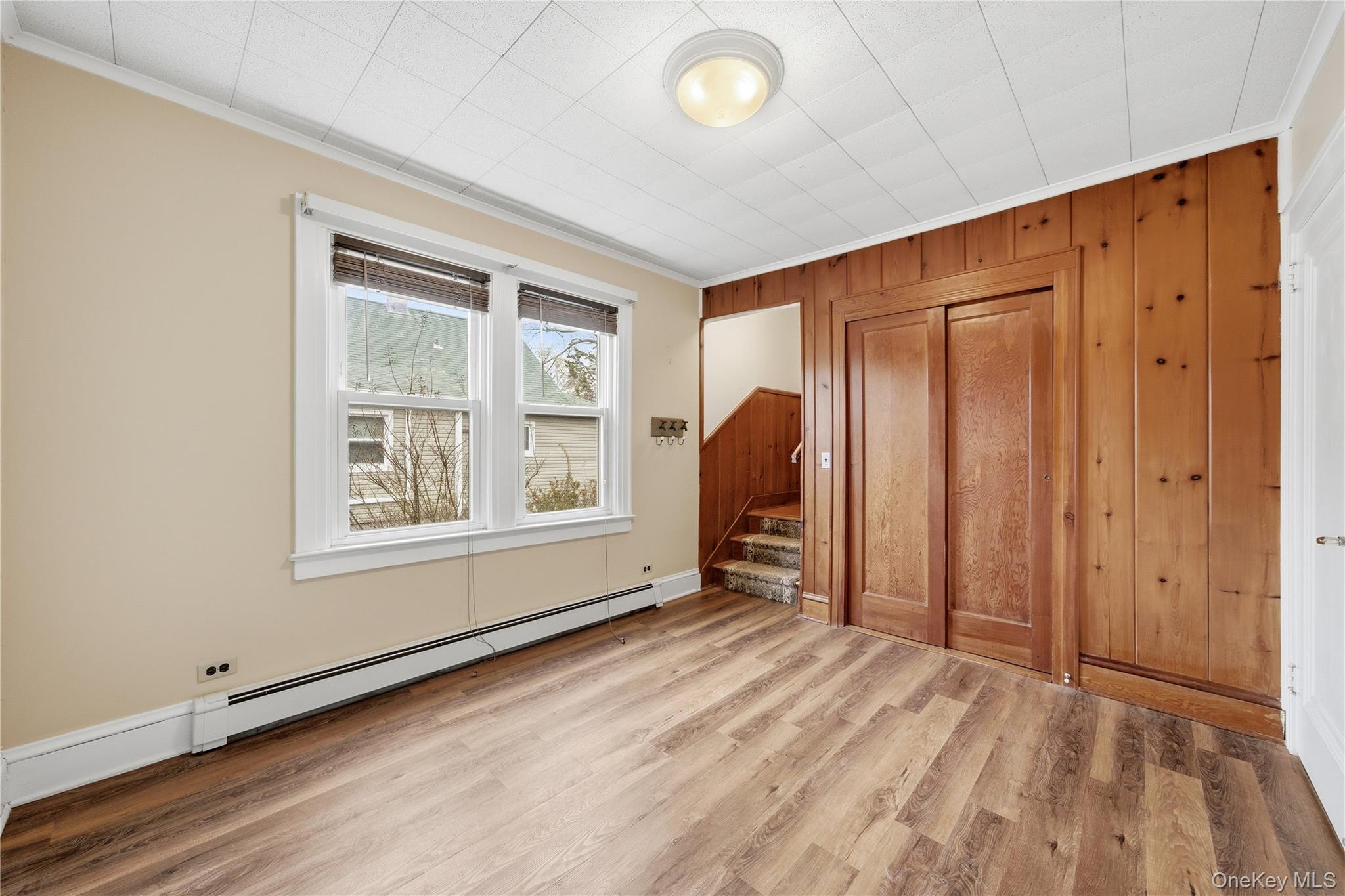 147 Church Avenue Islip, NY 11751 - Photo 22 of 40 an empty room with windows and closet
