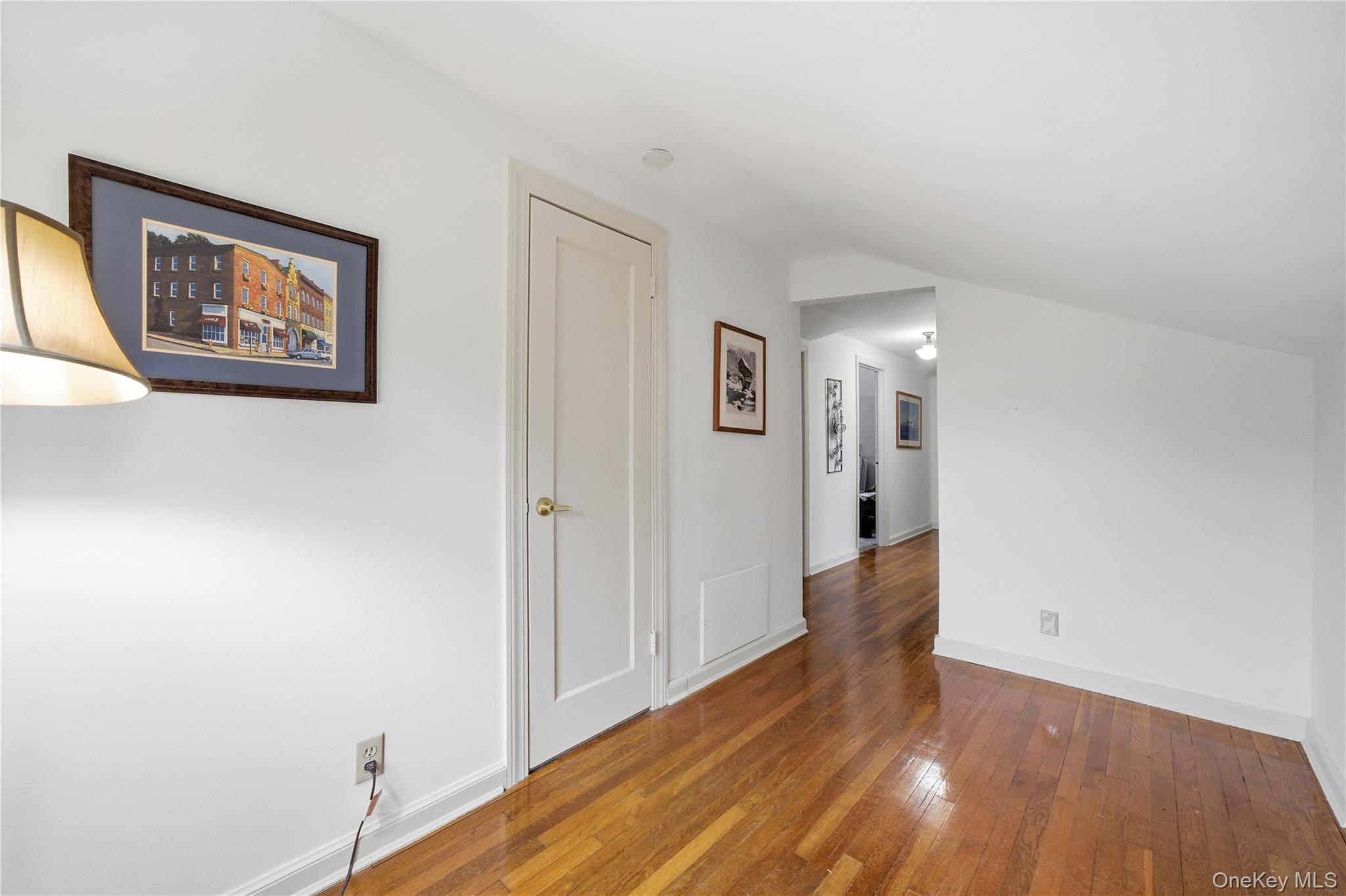 147 Church Avenue Islip, NY 11751 - Photo 30 of 40 a view of an empty room with wooden floor