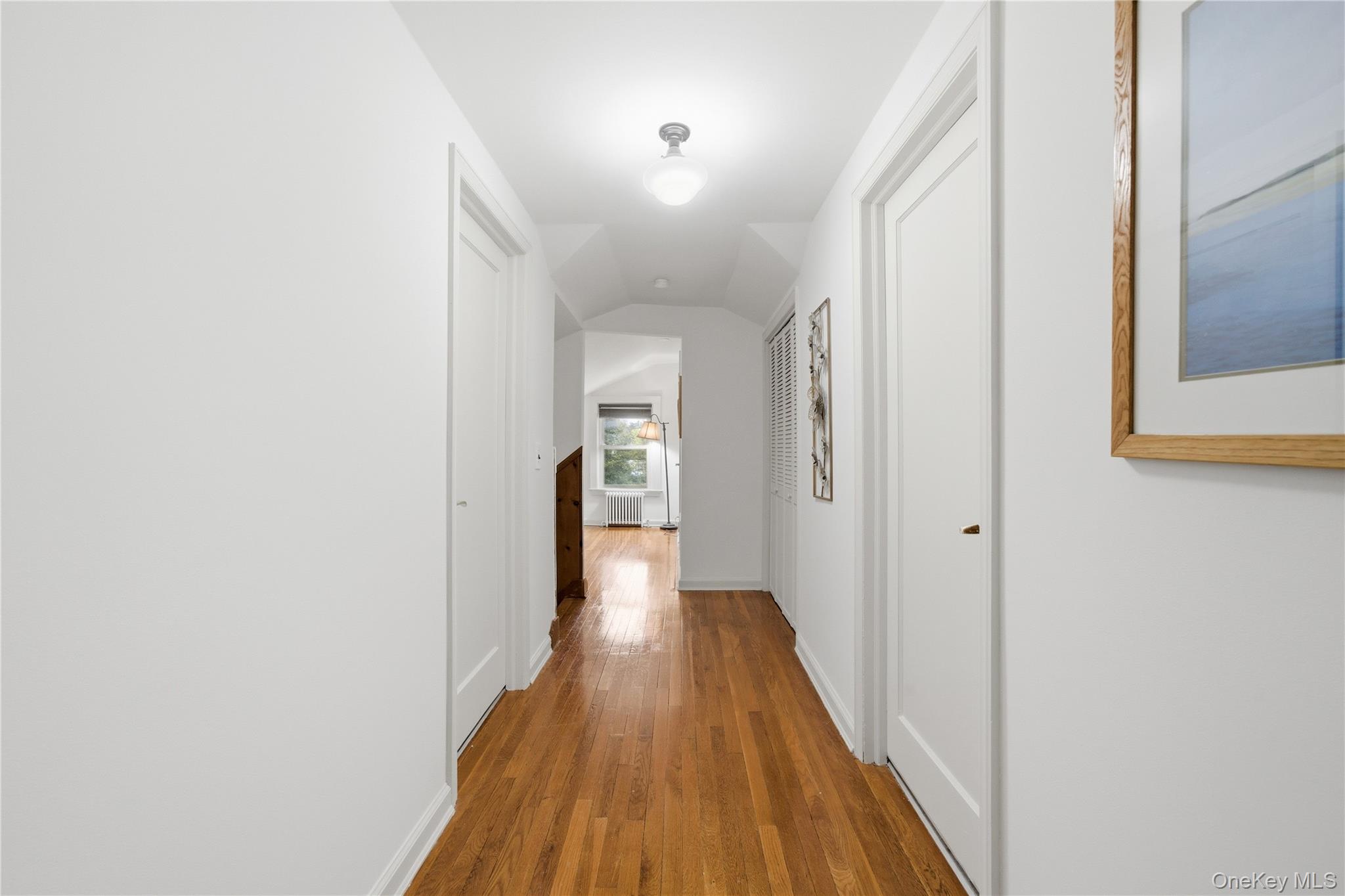 147 Church Avenue Islip, NY 11751 - Photo 33 of 40 a view of a hallway with wooden floor