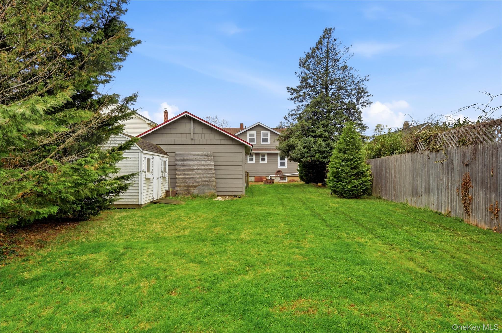147 Church Avenue Islip, NY 11751 - Photo 37 of 40 a view of a backyard of the house