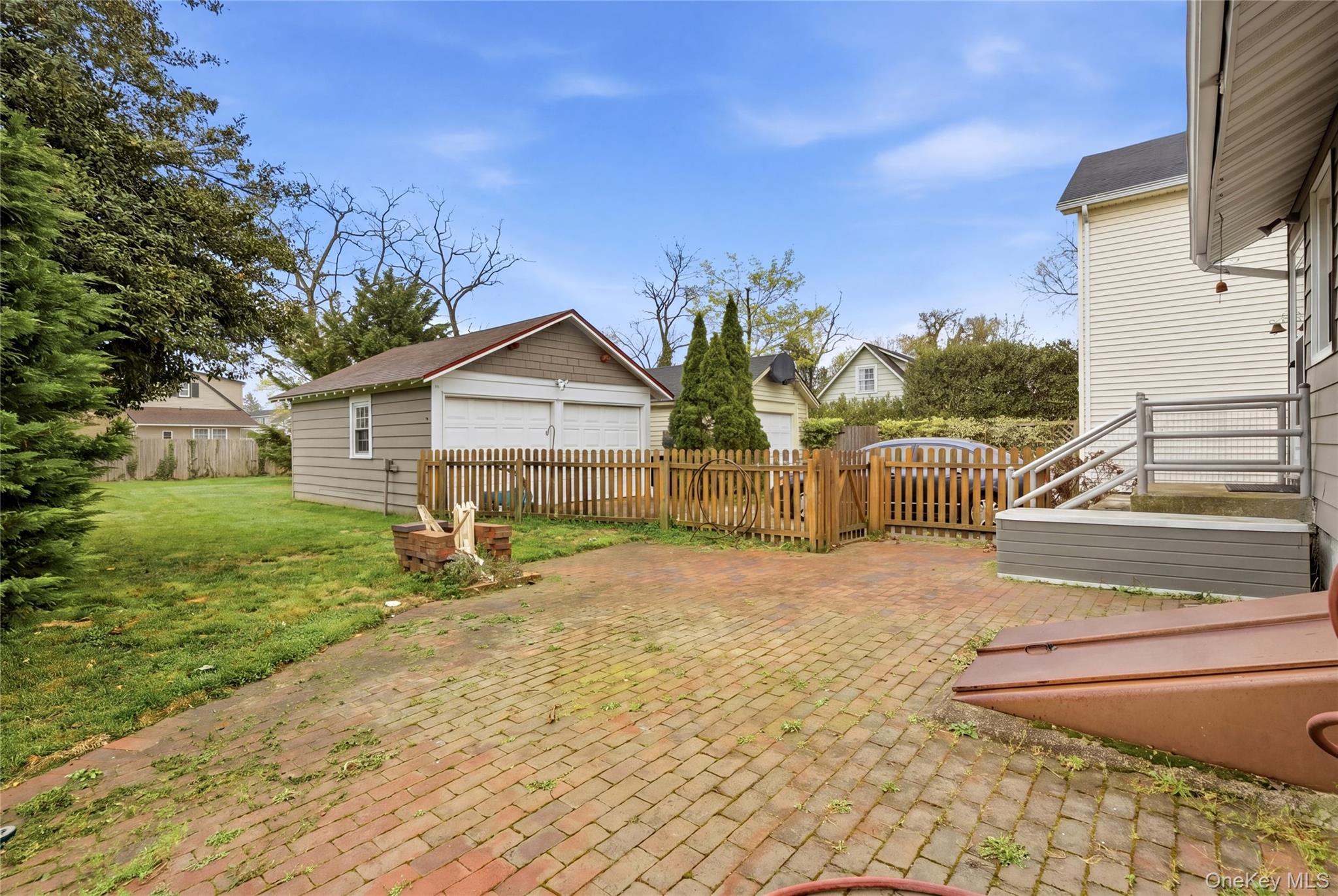 147 Church Avenue Islip, NY 11751 - Photo 39 of 40 a view of a house with backyard and sitting area