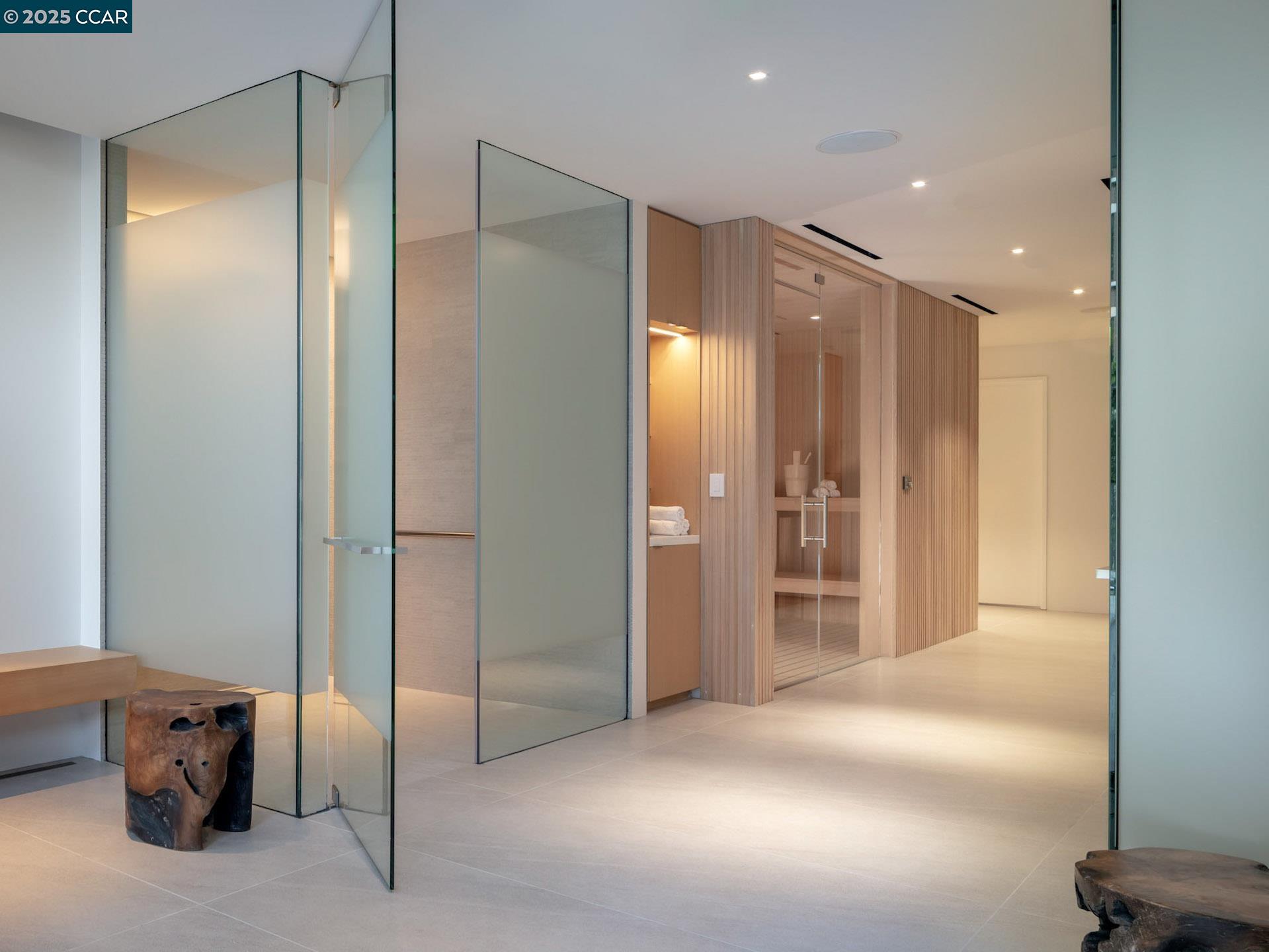 1 Steuart Street, Unit 1103 San Francisco, CA 94105 - Photo 21 of 31 a bathroom with a glass door shower