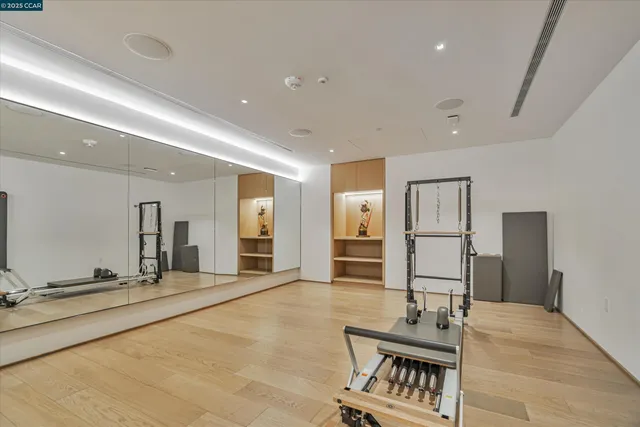 a view of a patio with a table and chairs