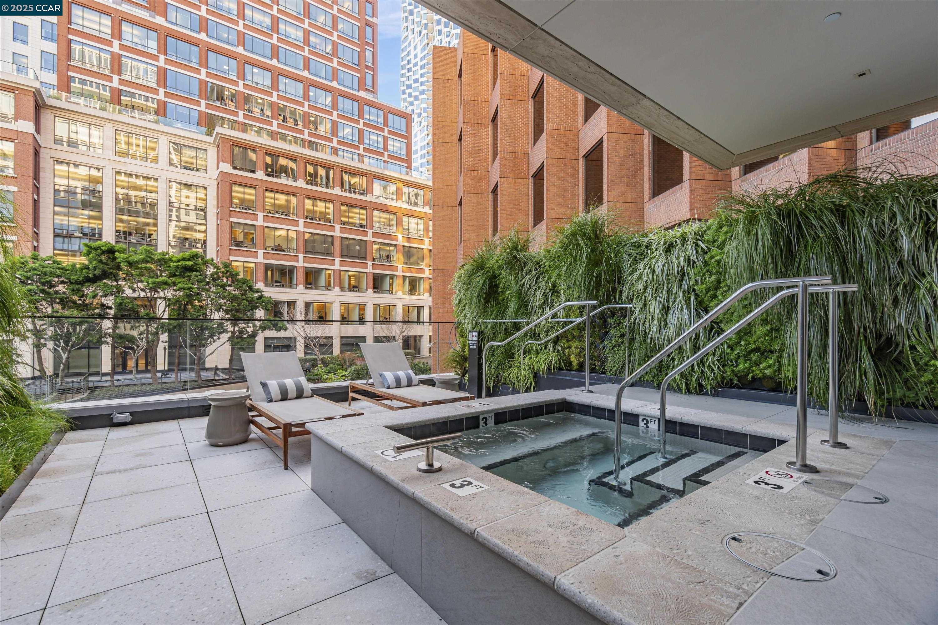 1 Steuart Street, Unit 1103 San Francisco, CA 94105 - Photo 27 of 31 a swimming pool with outdoor seating and yard