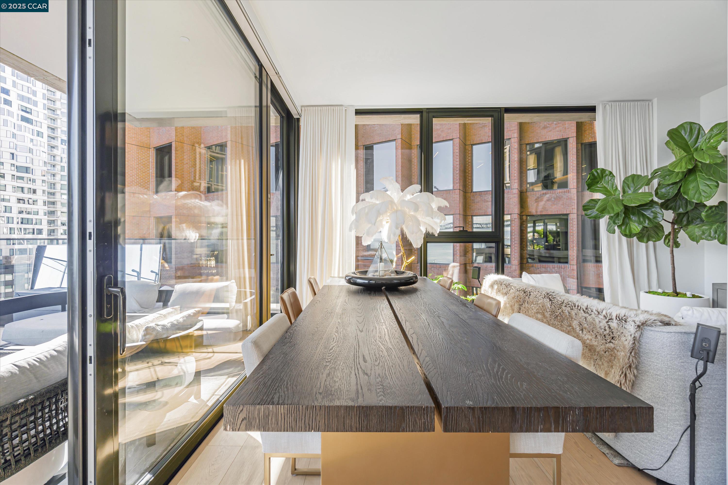 1 Steuart Street, Unit 1103 San Francisco, CA 94105 - Photo 5 of 31 a living room with large window