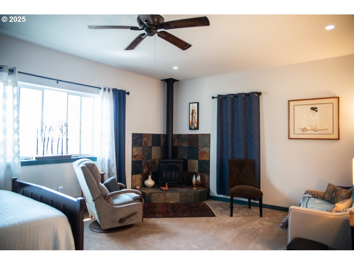 62725 Eagle Road Bend, OR 97701 - Photo 12 of 39 a living room with furniture and a window