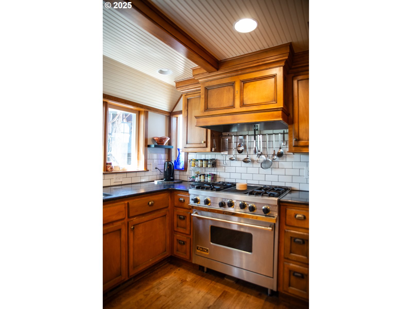 62725 Eagle Road Bend, OR 97701 - Photo 15 of 39 a kitchen with a stove and a sink