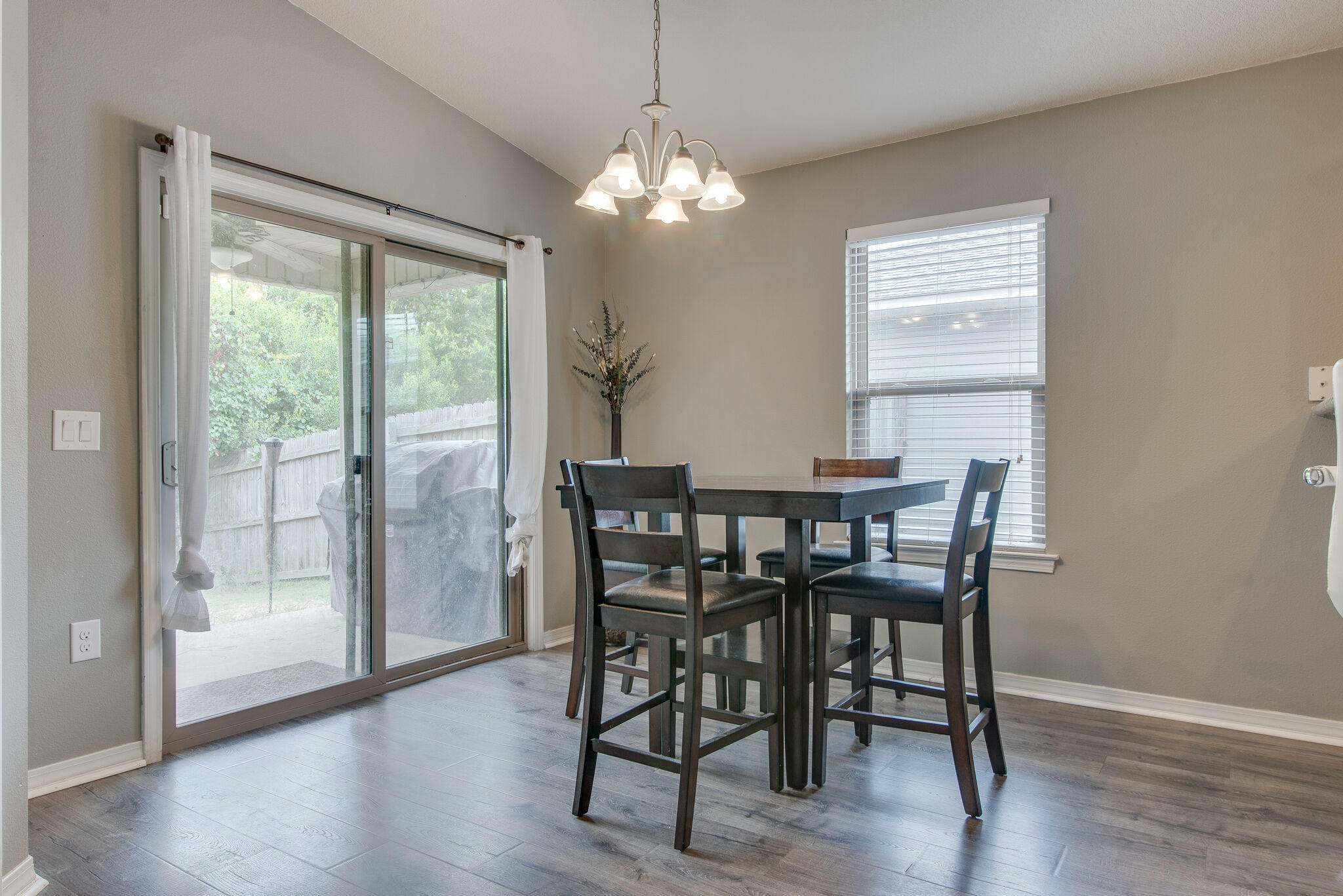 2362 Duncan Ridge Drive Navarre, FL 32566 - Photo 16 of 28 a view of a dining room with furniture window and wooden floor