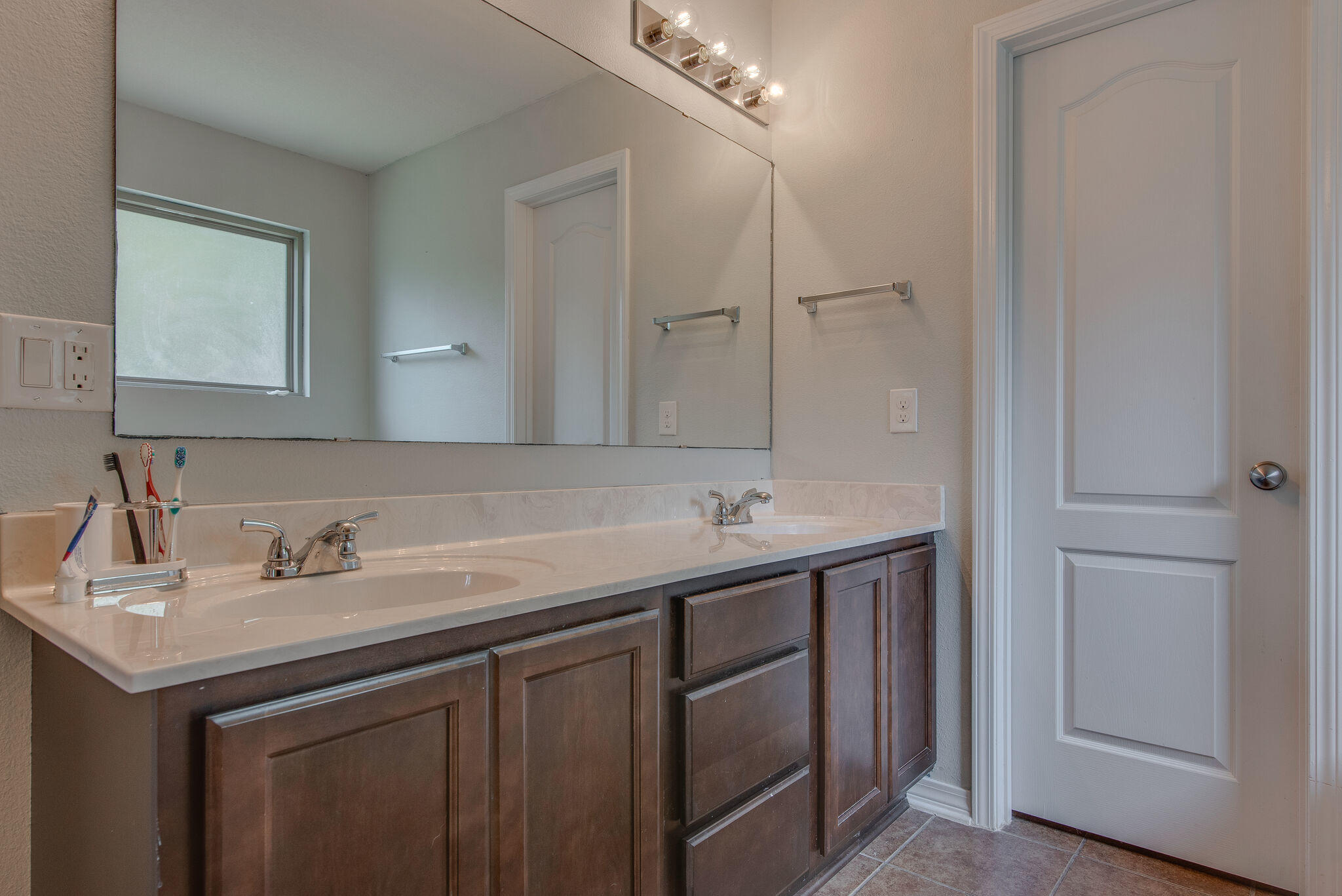 2362 Duncan Ridge Drive Navarre, FL 32566 - Photo 21 of 28 a bathroom with a sink and a mirror
