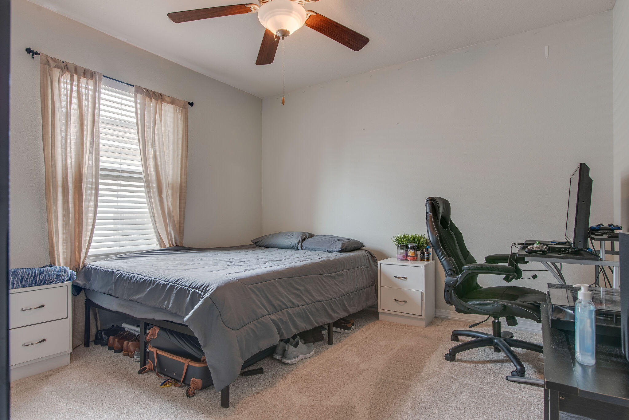 2362 Duncan Ridge Drive Navarre, FL 32566 - Photo 22 of 28 a bedroom with a bed a desk and chair