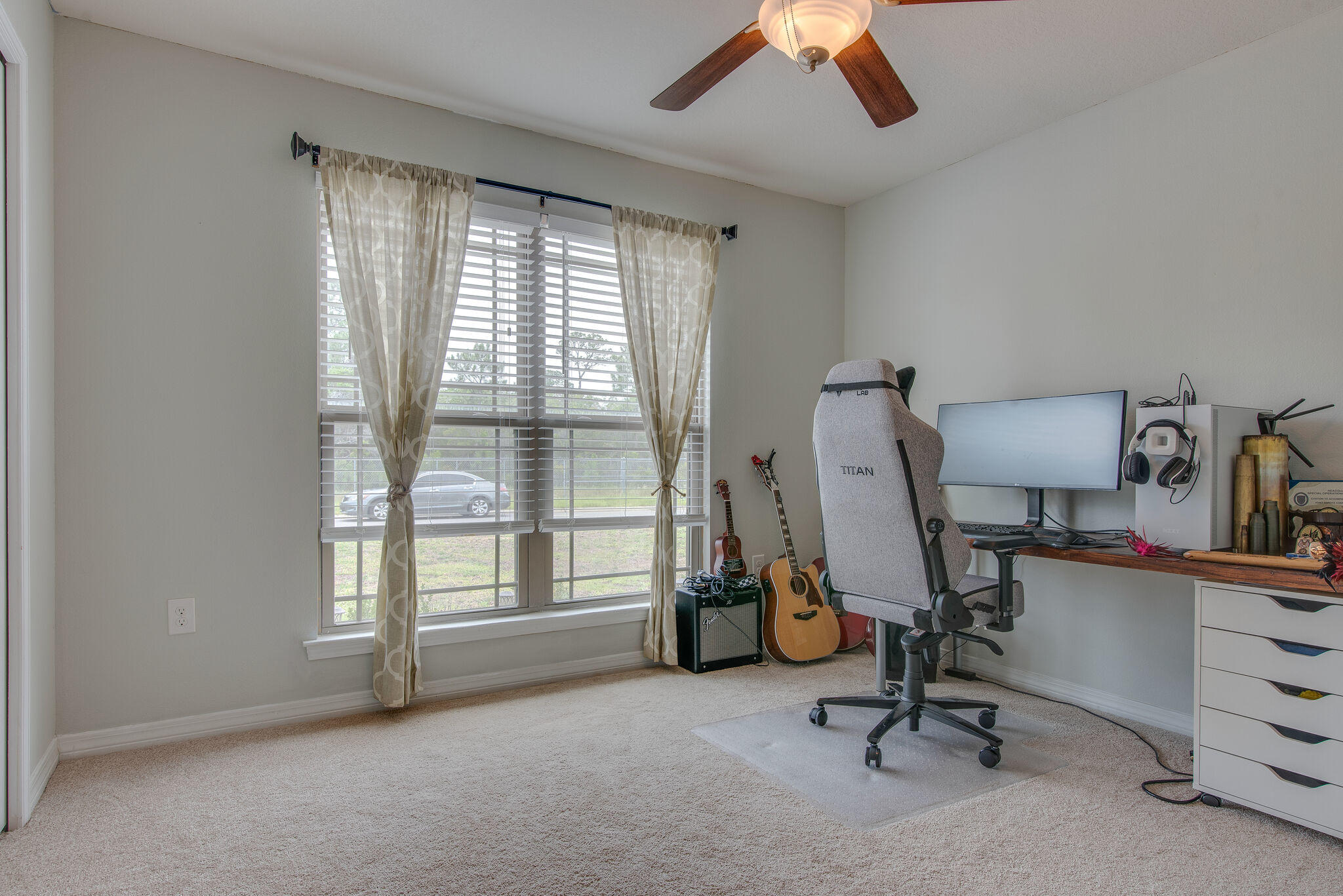 2362 Duncan Ridge Drive Navarre, FL 32566 - Photo 25 of 28 a view of a workspace with furniture and a window