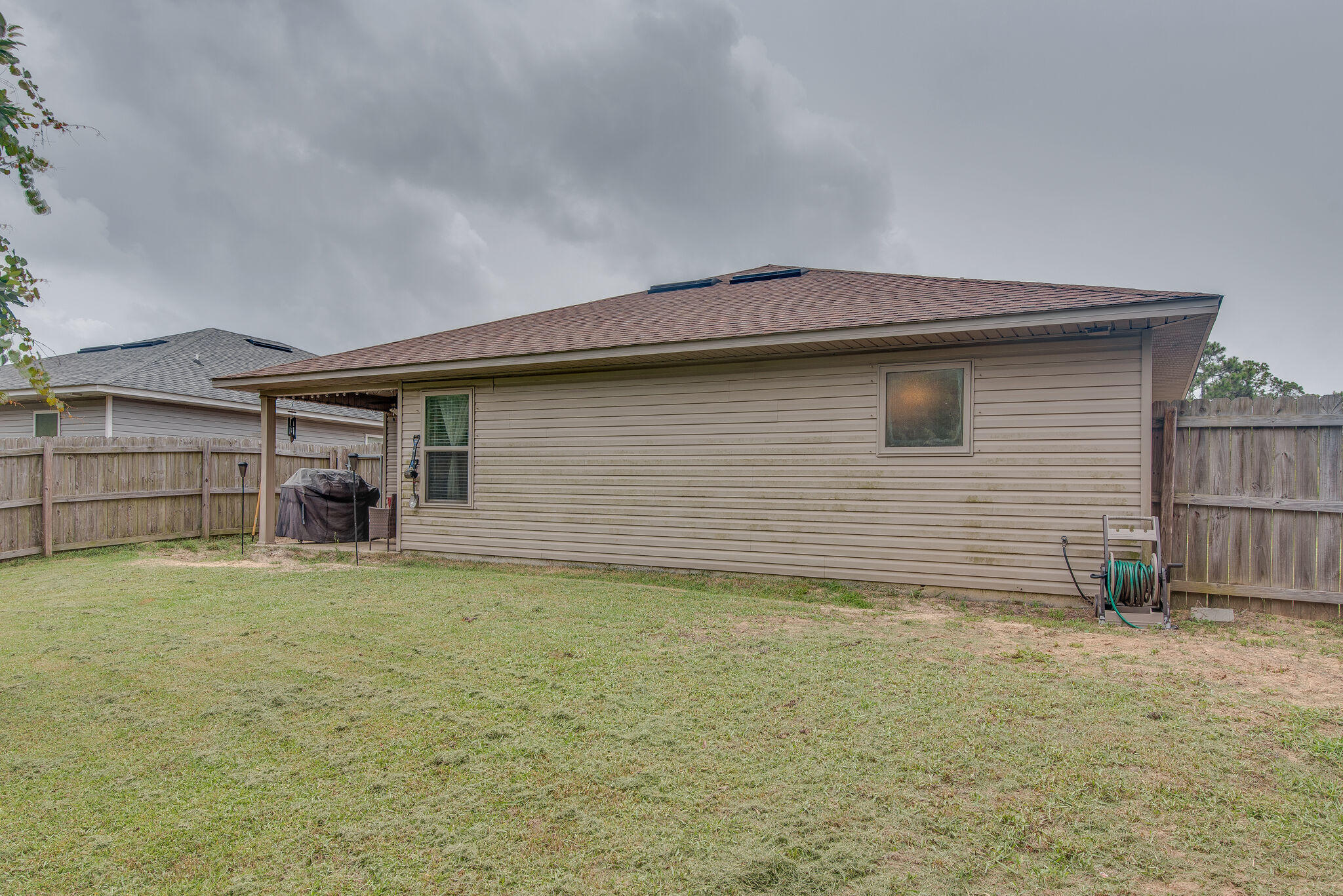 2362 Duncan Ridge Drive Navarre, FL 32566 - Photo 27 of 28 a house with a outdoor space