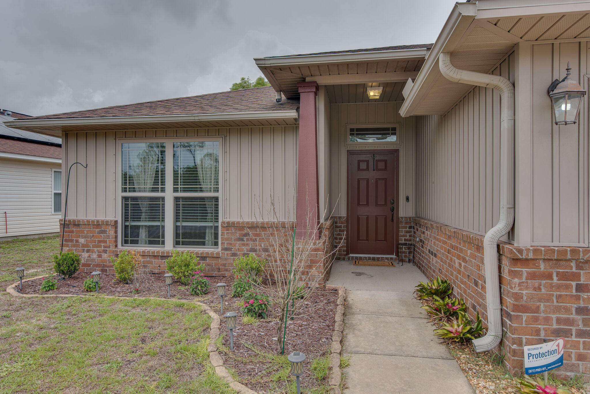 2362 Duncan Ridge Drive Navarre, FL 32566 - Photo 5 of 28 a front view of a house