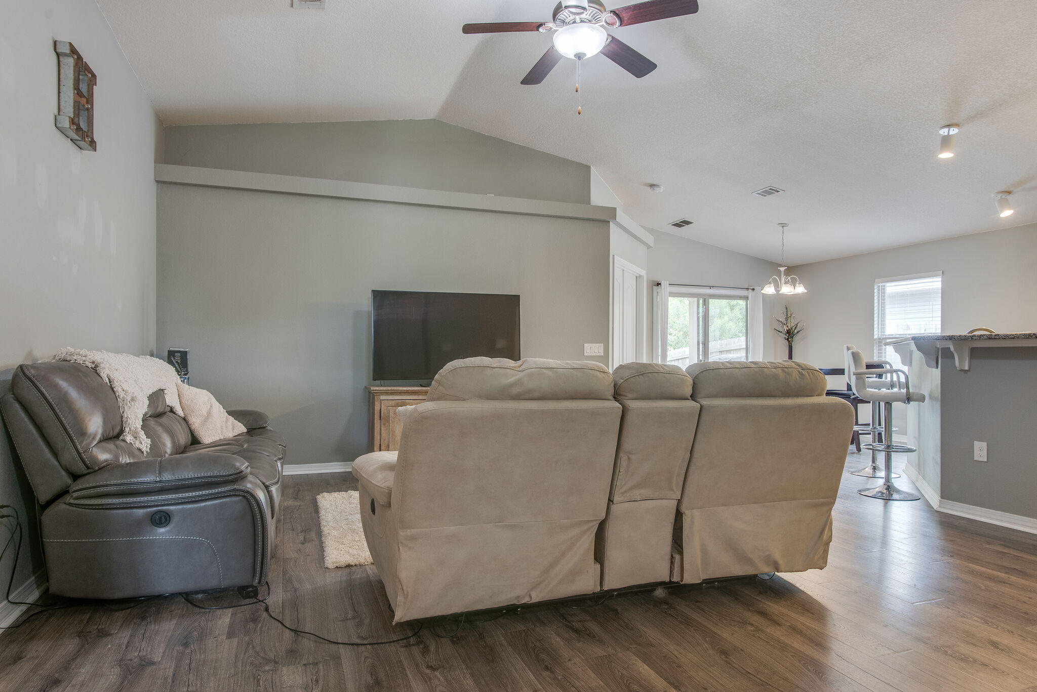2362 Duncan Ridge Drive Navarre, FL 32566 - Photo 8 of 28 a living room with furniture and a fireplace