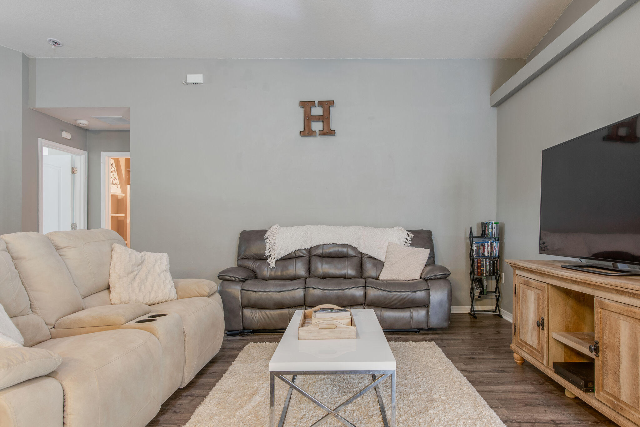 2362 Duncan Ridge Drive Navarre, FL 32566 - Photo 10 of 28 a living room with furniture and a flat screen tv