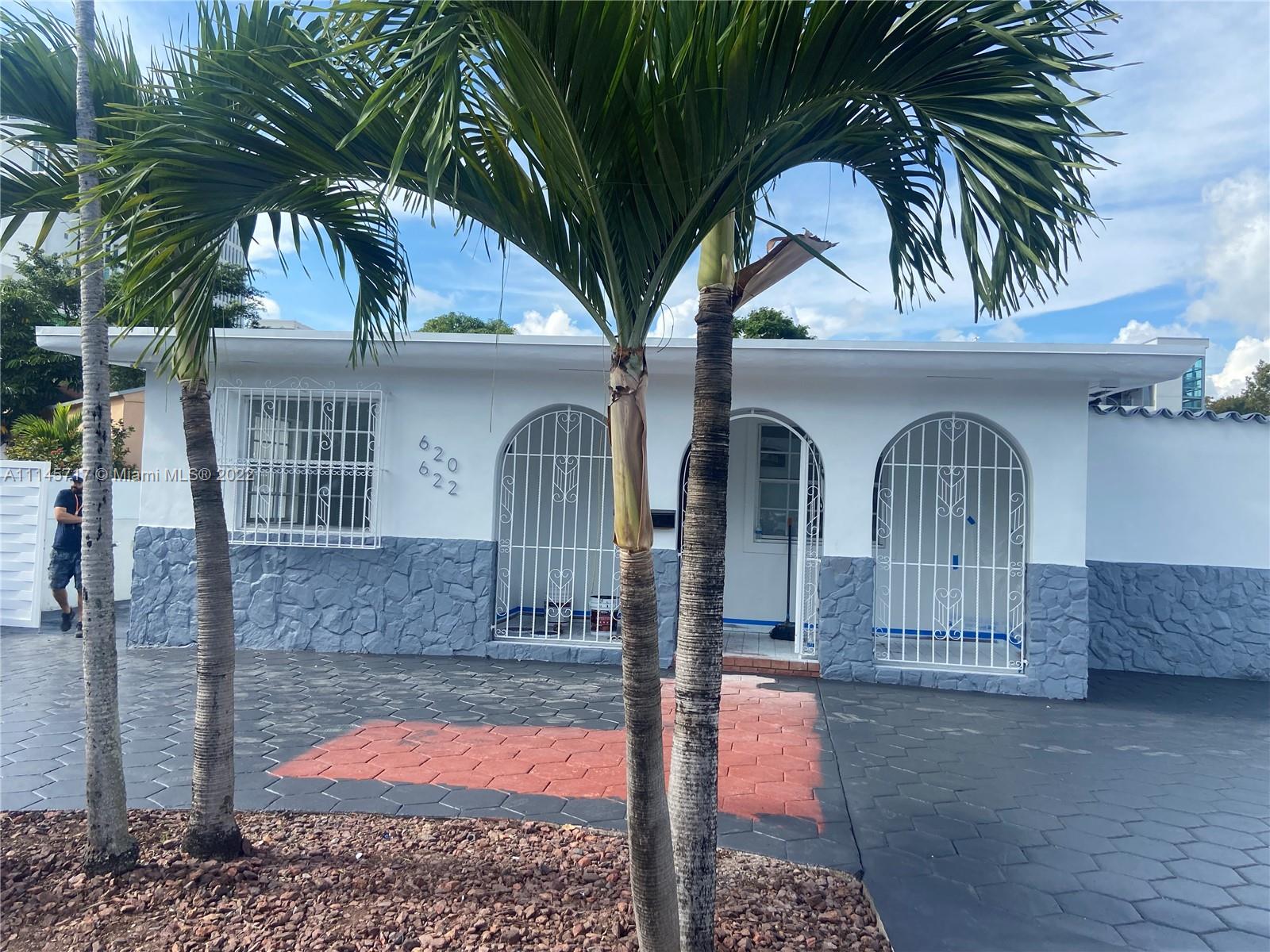 620 Beacom Boulevard, Unit 3 Miami, FL 33135 - Photo 1 of 1 a front view of a house with balcony