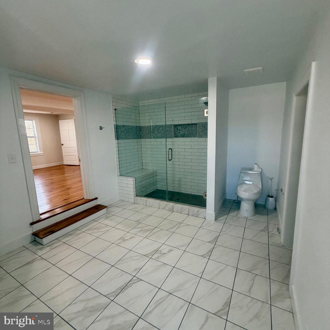 17700 Barnesville Road Dickerson, MD 20842 - Photo 13 of 20 Spacious bathroom with modern shower design.