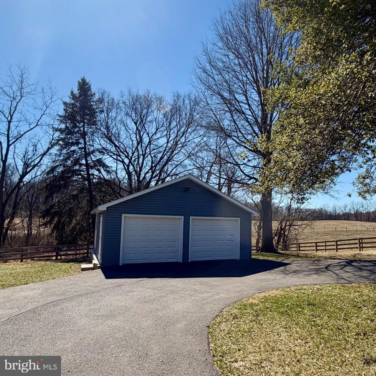 17700 Barnesville Road Dickerson, MD 20842 - Photo 4 of 20 Charming garage nestled in serene landscape.