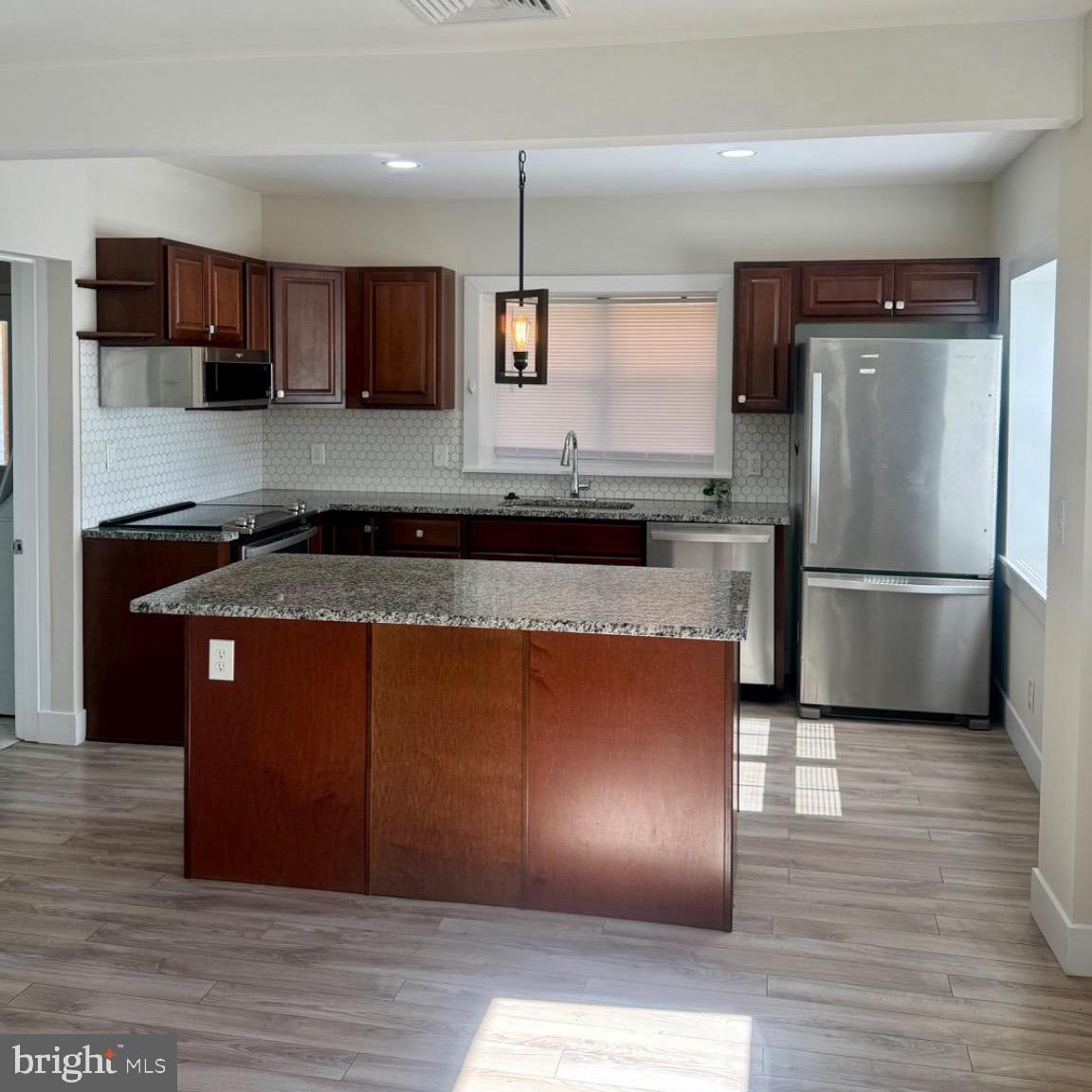 17700 Barnesville Road Dickerson, MD 20842 - Photo 6 of 20 Modern kitchen with sleek finishes.