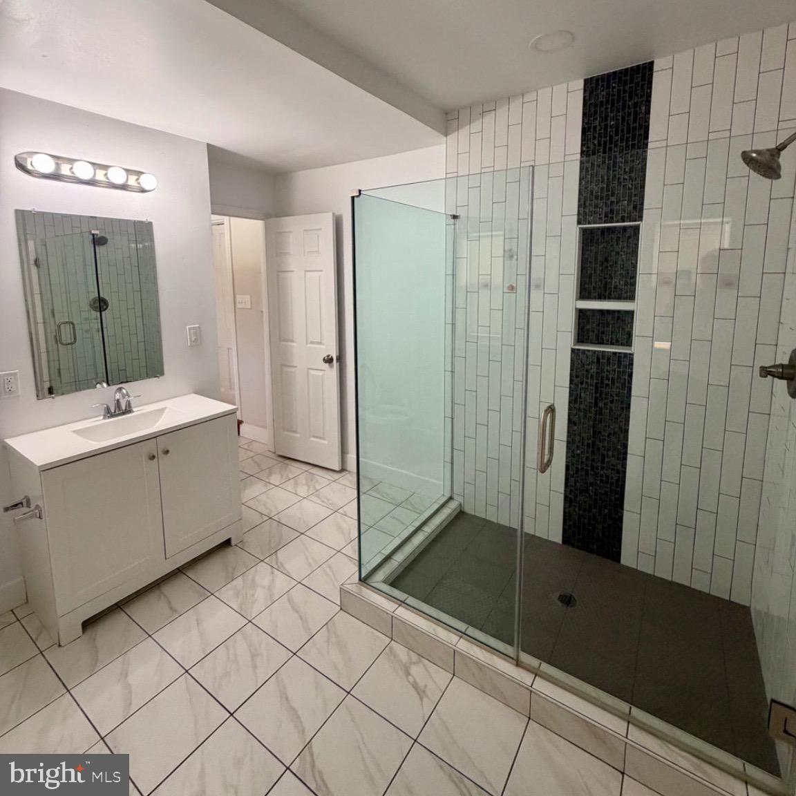 17700 Barnesville Road Dickerson, MD 20842 - Photo 7 of 20 Modern bathroom with sleek glass shower.