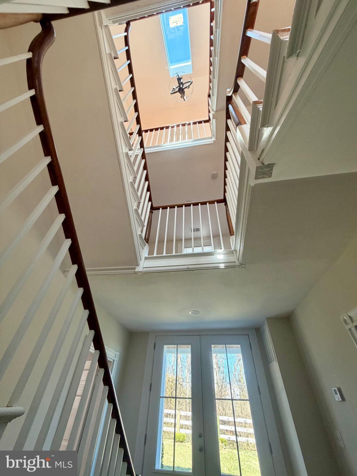 17700 Barnesville Road Dickerson, MD 20842 - Photo 9 of 20 Bright and airy staircase with skylight view.