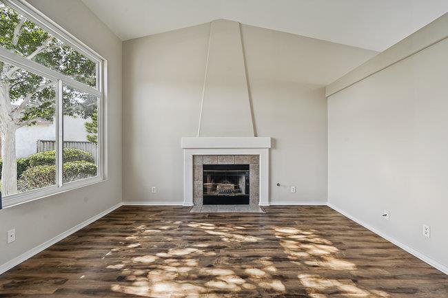 2240 Preston Court Hollister, CA 95023 - Photo 7 of 21 a view of empty room with window and fireplace