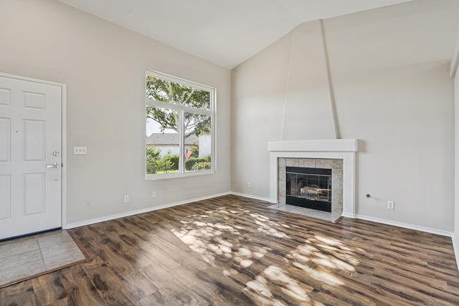 2240 Preston Court Hollister, CA 95023 - Photo 8 of 21 a view of empty room with window and fireplace