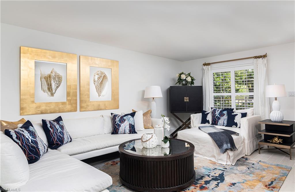 1222 Gordon Drive, Unit 4 Naples, FL 34102 - Photo 3 of 20 a living room with furniture and a window