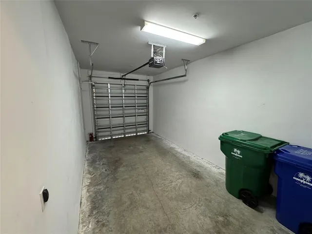 a bathroom with a toilet sink and vanity