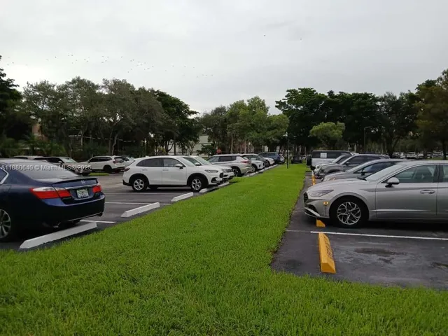 a view of a lake with a building in the background