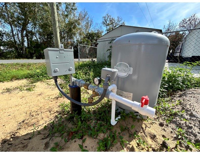 0 Howison Road Kissimmee, FL 34746 - Photo 4 of 14 a front view of a house with a yard