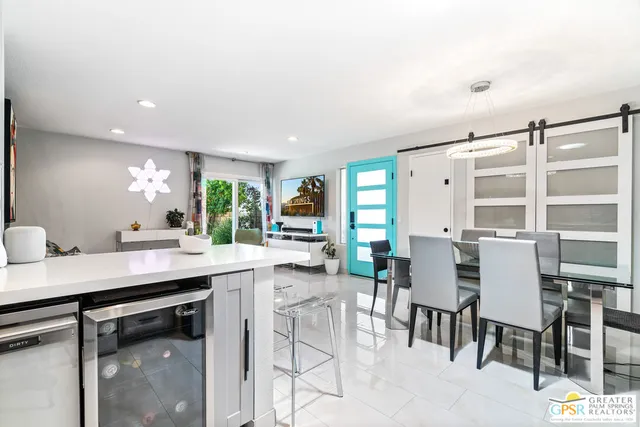 a bathroom with a sink toilet a mirror and shower