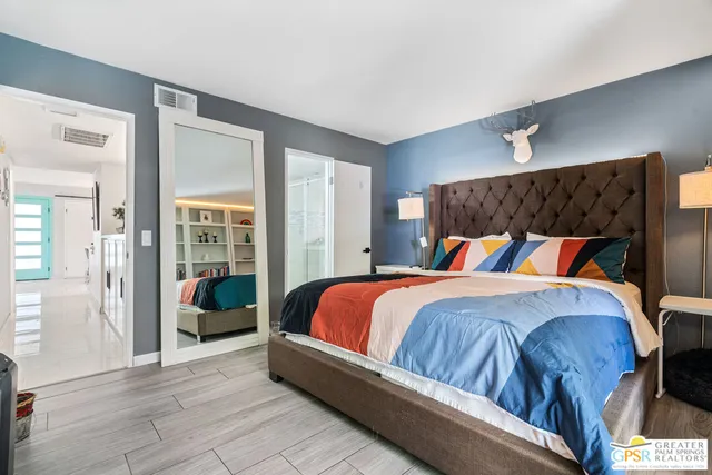 a bathroom with a double vanity sink mirror and