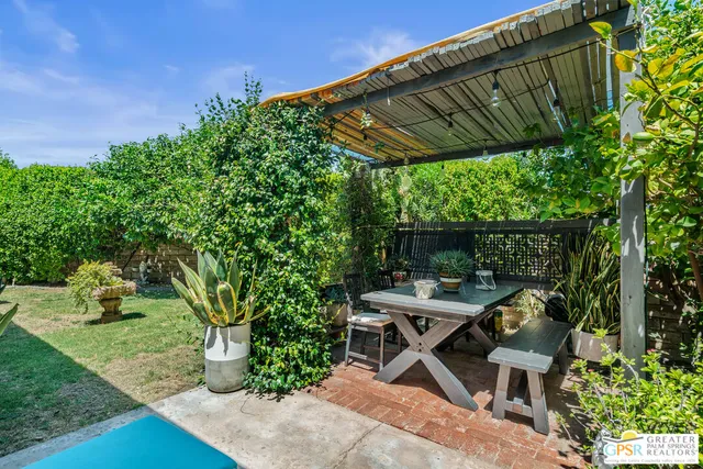 a house view with a garden space