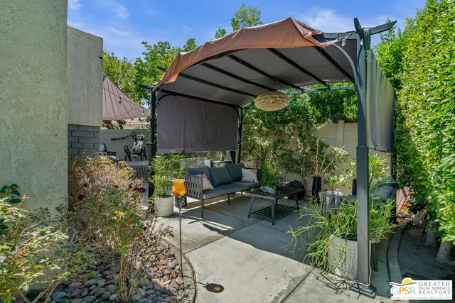 a building outdoor space with patio furniture