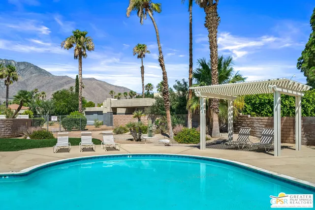 a patio with a yard table and chairs
