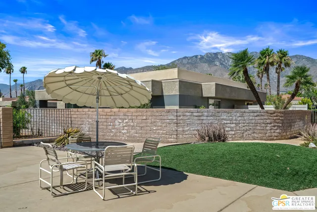 a view of a sitting area with swimming pool and sitting area
