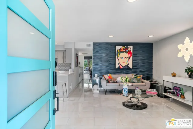 a room with lots of furniture and clutter