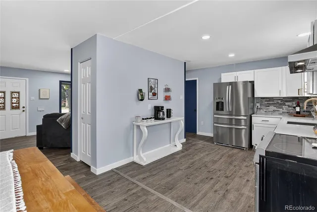 a living room with furniture and a couch