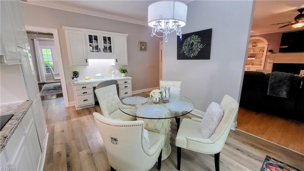 7035 Skylark Road Pfafftown, NC 27040 - Photo 5 of 47 Breakfast Area with Built-In Desk Space & Custom Storage for Everyday Living!