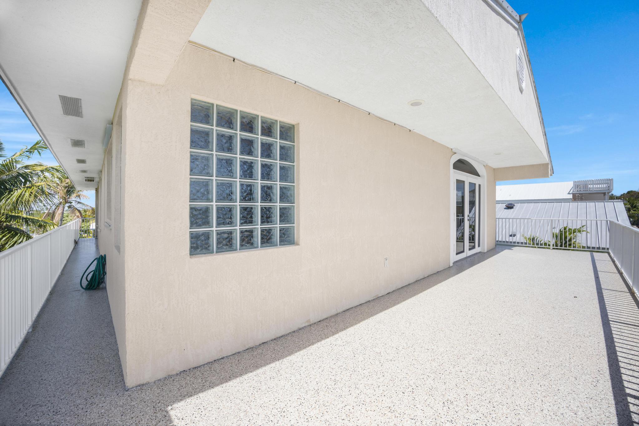 247 Apache Street Tavernier, FL 33070 - Photo 40 of 94 Primary Suite Deck