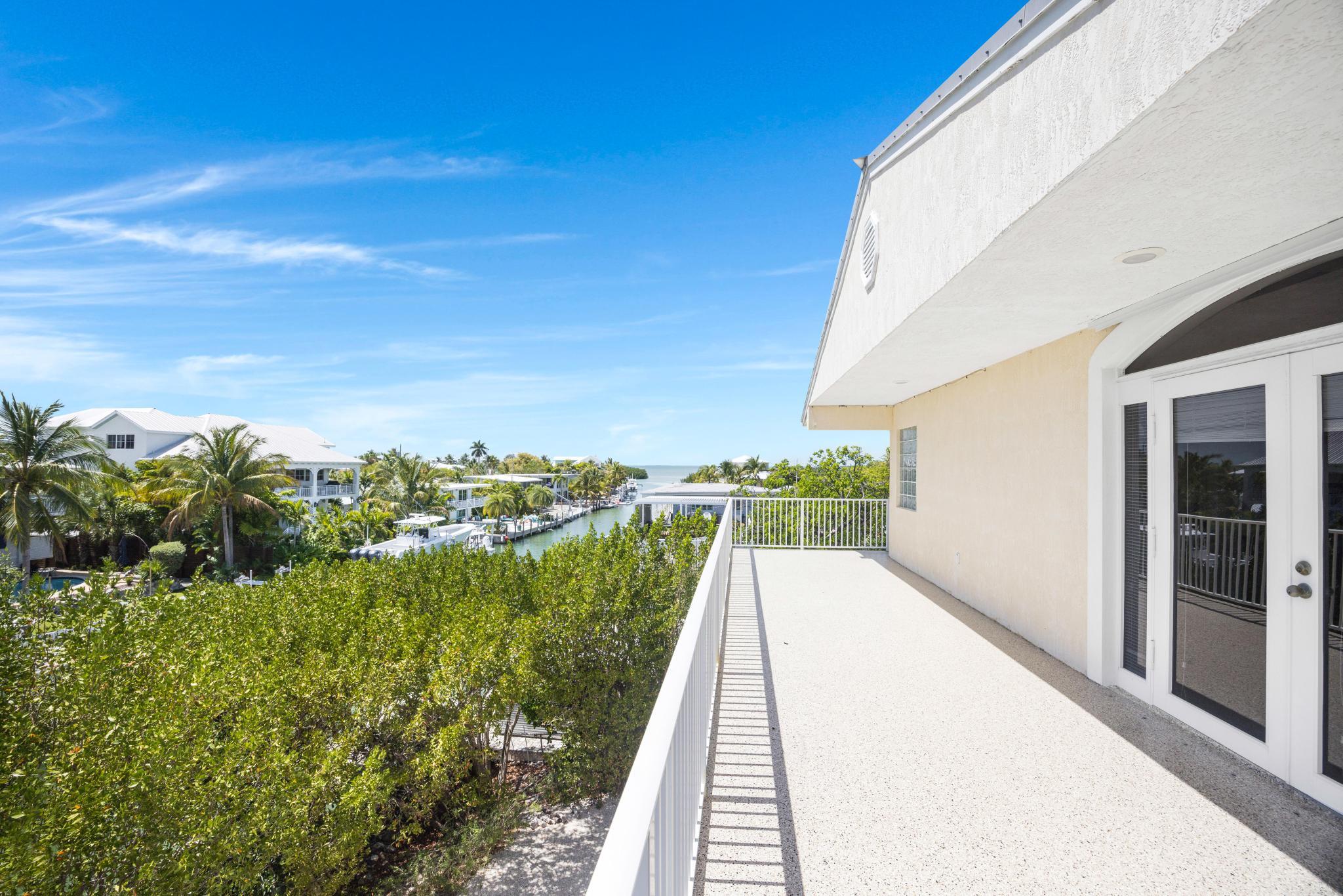 247 Apache Street Tavernier, FL 33070 - Photo 43 of 94 Primary Suite Deck