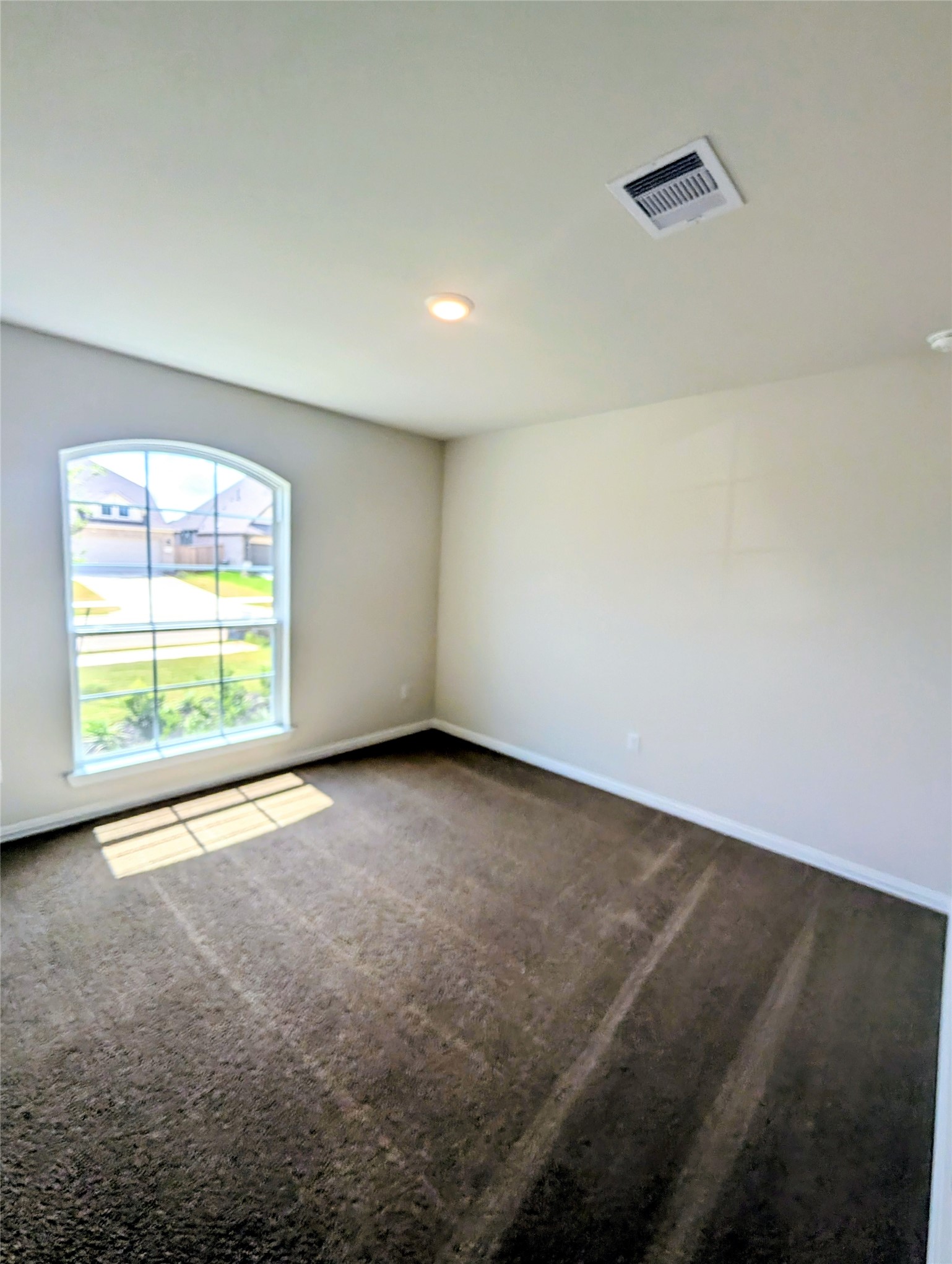 32314 Mimosa Ridge Lane Waller, TX 77484 - Photo 13 of 16 an empty room with a window