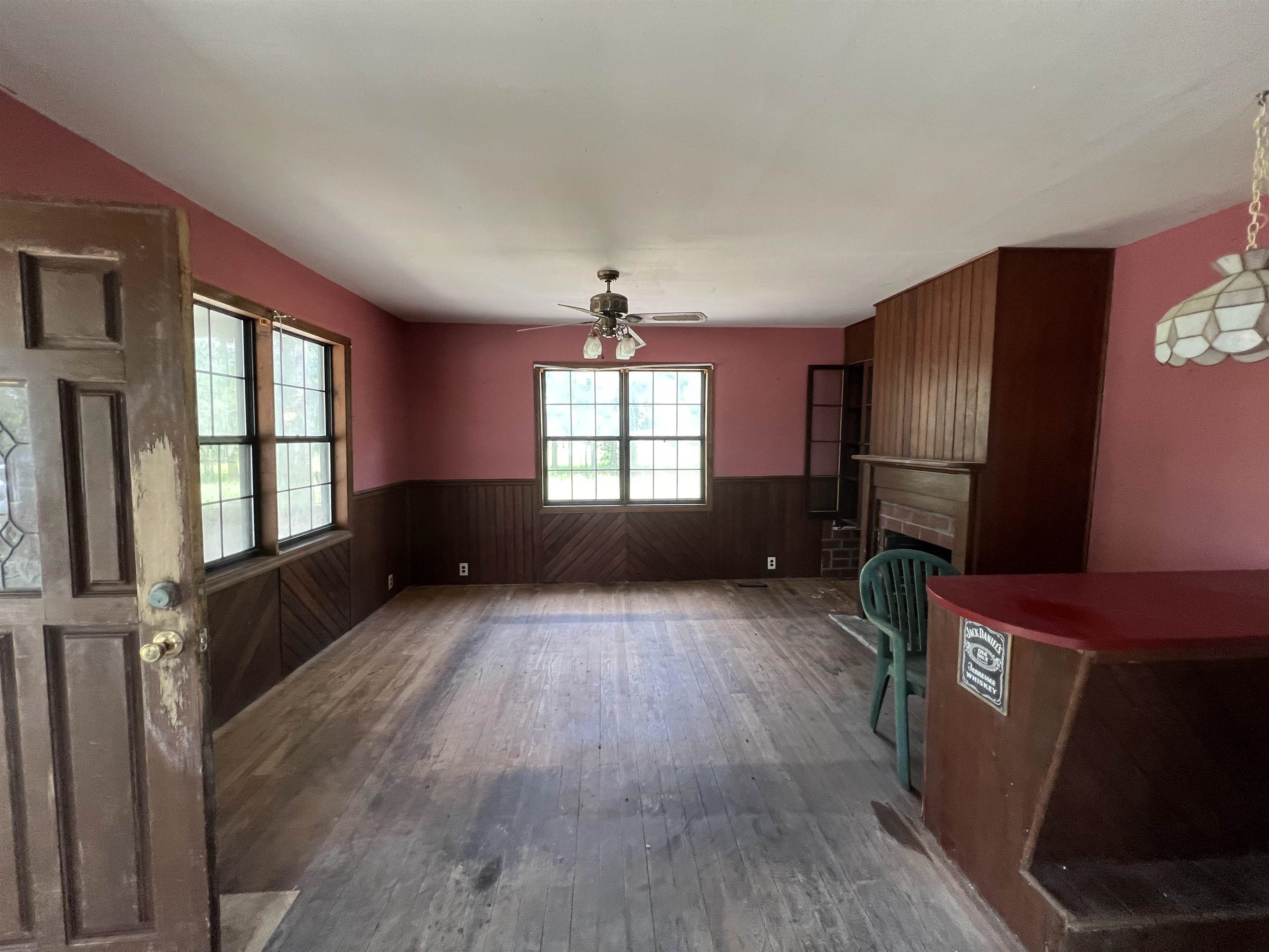 9680 Luther Beck Road Hastings, FL 32145 - Photo 11 of 24 a living room with furniture window and wooden floor