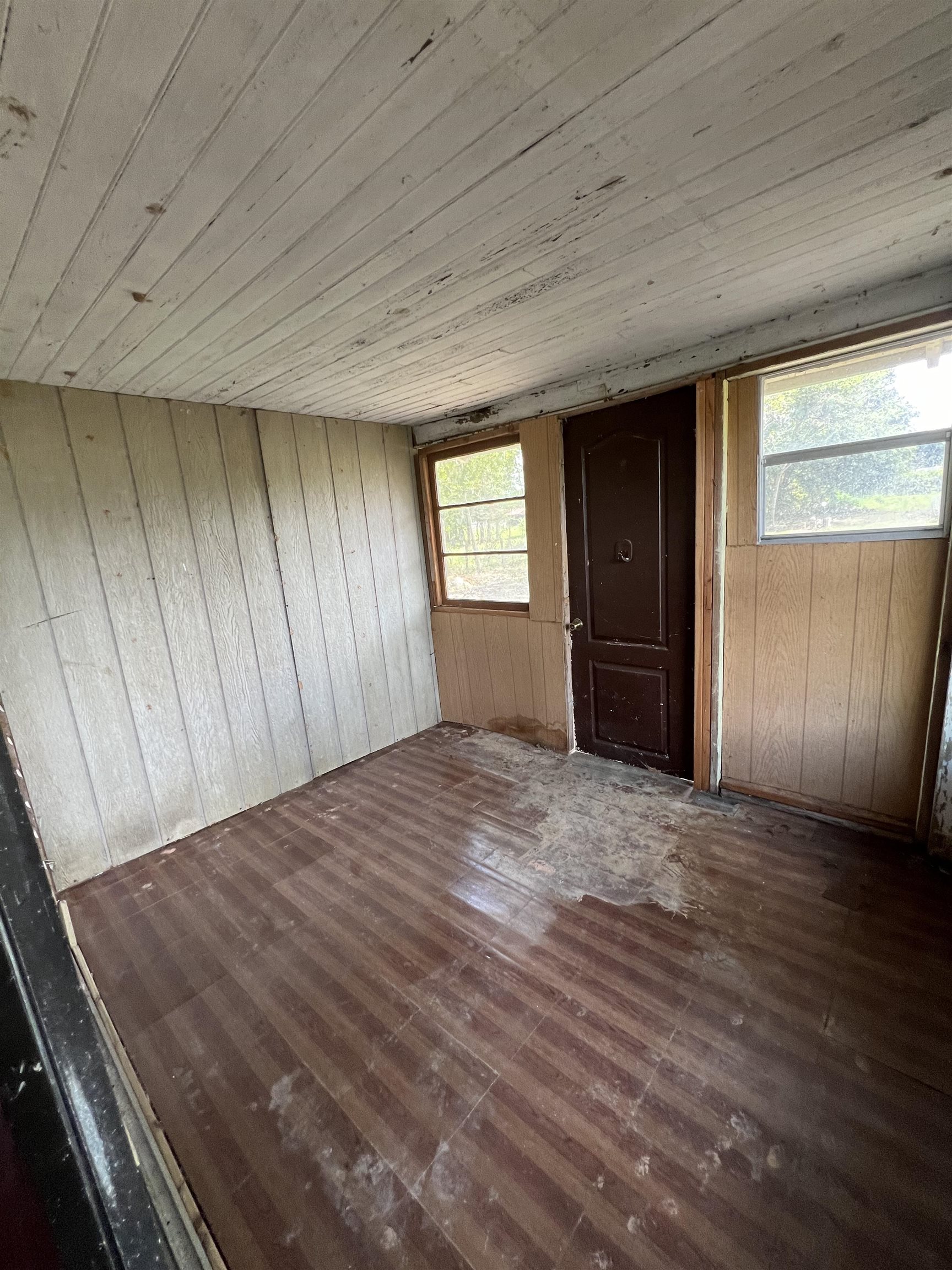 9680 Luther Beck Road Hastings, FL 32145 - Photo 18 of 24 an empty room with closet and windows