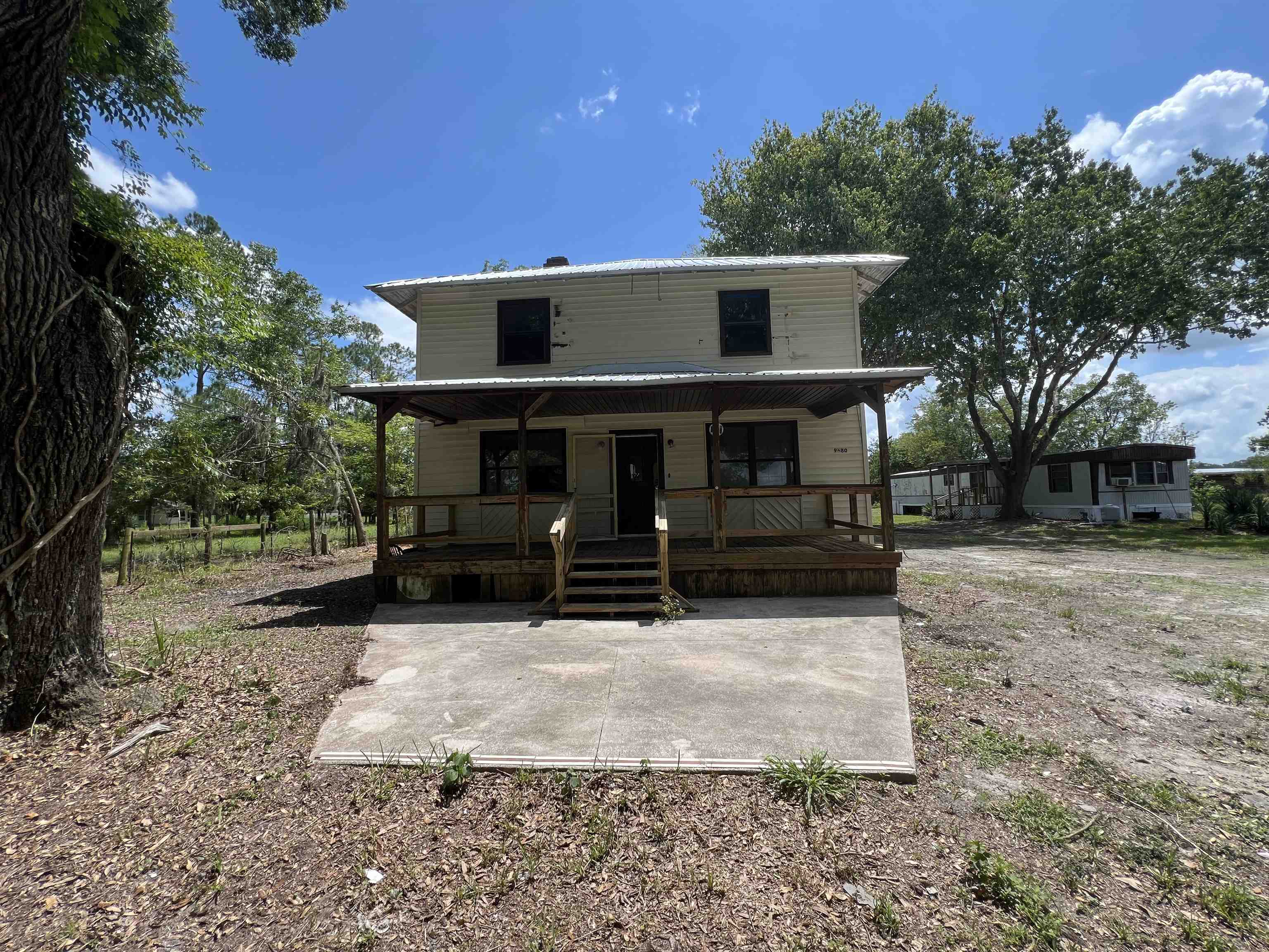 9680 Luther Beck Road Hastings, FL 32145 - Photo 24 of 24 a front view of a house with a yard