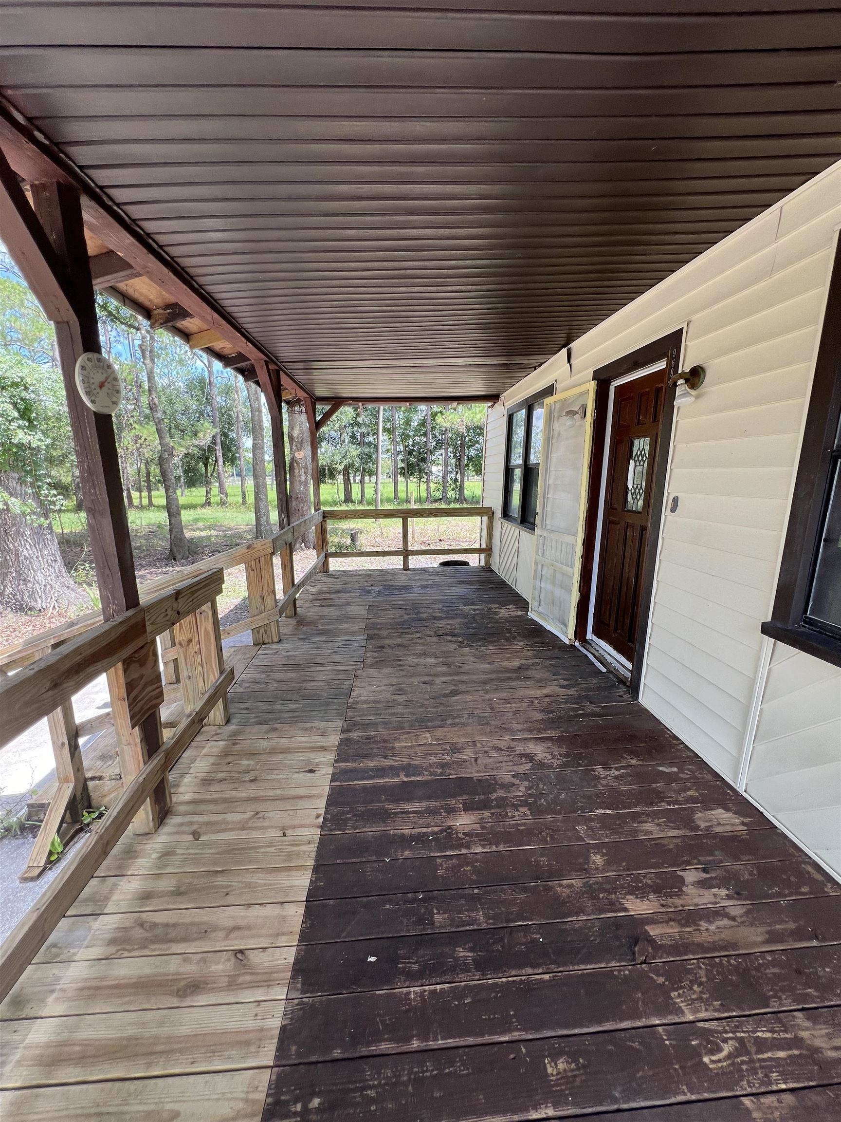 9680 Luther Beck Road Hastings, FL 32145 - Photo 9 of 24 a view of a porch